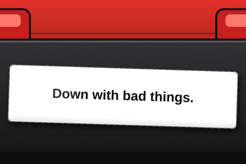 Down with bad things. bumper sticker on a car bumper