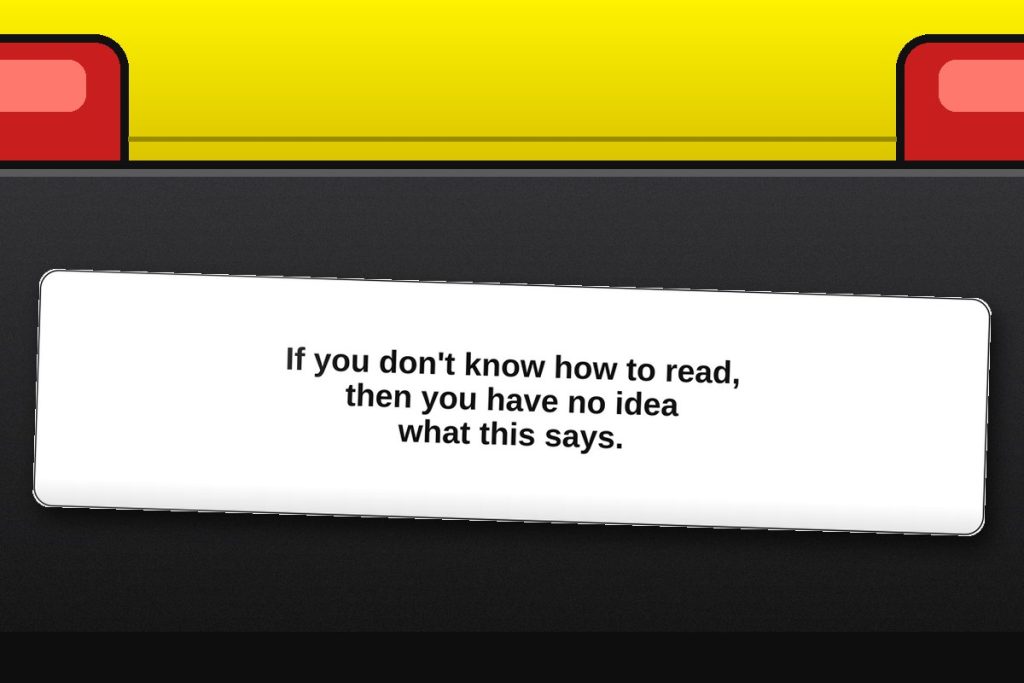 If you don't know how to read, then you have no idea what this says. bumper sticker on a car bumper